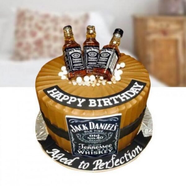 Jack-Daniels Cake infused with whiskey flavor, featuring rich chocolate layers, ideal for birthdays, parties, or whiskey lovers.