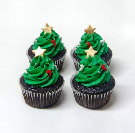 Christmas Tree Cup Cakes decorated with green frosting and holiday sprinkles, ideal for Christmas parties and festive celebrations.