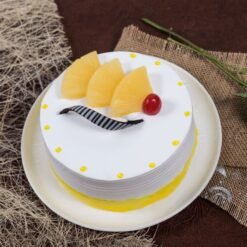 Fruity Pineapple Cake with juicy pineapple layers and whipped cream, ideal for summer gatherings, birthdays, and tropical-themed celebrations.