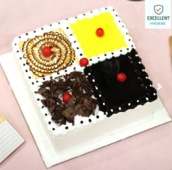 Four Flavored Cake featuring a variety of four distinct and delicious flavors, perfect for celebrations and catering to diverse taste preferences.