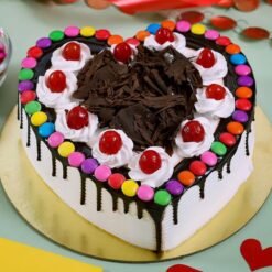 Heart Design Gems Cake featuring a beautifully decorated heart-shaped cake adorned with colorful edible gems and elegant frosting, ideal for romantic celebrations.