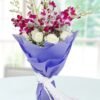 Stunning bouquet of beautiful roses and orchids, combining vibrant colors and textures, ideal for gifts on special occasions and celebrations.