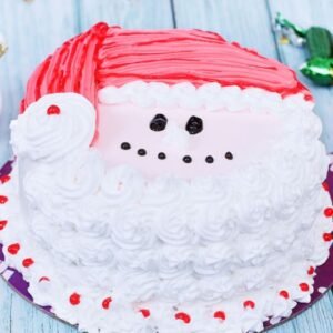 Santa Designer Cake decorated with festive Santa motifs, ideal for Christmas celebrations and holiday parties.