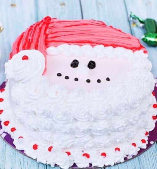 Santa Designer Cake decorated with festive Santa motifs, ideal for Christmas celebrations and holiday parties.
