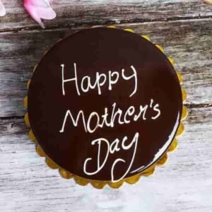 Mother’s Day Truffle Cake showcasing layers of rich chocolate sponge cake topped with creamy truffle frosting and elegant decorations, ideal for celebrating moms.