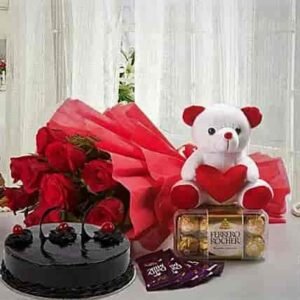 Valentine's Day Combo featuring a beautiful bouquet of flowers, a box of chocolates, and a romantic gift, ideal for expressing love.