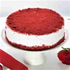 Red Velvet Christmas Cake with festive decorations, rich red velvet layers, and creamy frosting, ideal for holiday celebrations and Christmas gatherings.