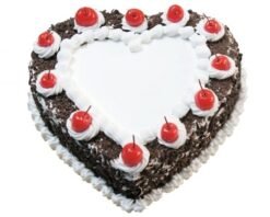 Heart-shaped Black Forest Cake with layers of chocolate, cherries, and cream, ideal for romantic occasions and special celebrations.