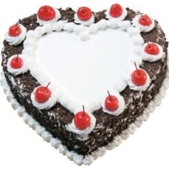 Heart-shaped Black Forest Cake with layers of chocolate, cherries, and cream, ideal for romantic occasions and special celebrations.