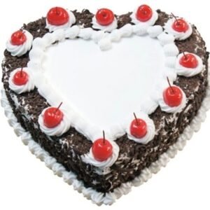 Heart-shaped Black Forest Cake with layers of chocolate, cherries, and cream, ideal for romantic occasions and special celebrations.