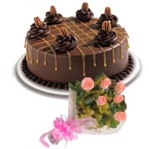 Chocolate Cake accompanied by a beautiful pink bouquet, ideal for birthdays, anniversaries, and special occasions.