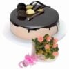 Chocolate Cake adorned with a beautiful pink bouquet, elegantly decorated for celebrations, perfect for birthdays, anniversaries, and special moments.