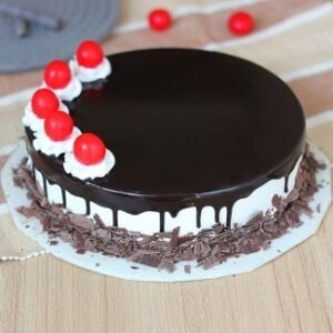 Delicious Cherished Black Forest Cake, featuring rich chocolate layers, whipped cream, and cherries, ideal for birthdays, anniversaries, or special celebrations.