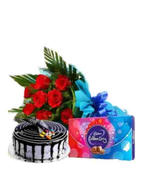 Complete Combo featuring a beautiful bouquet of flowers, a delicious cake, and an assortment of chocolates, perfect for celebrations and gifting.