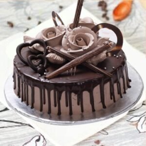 Designer Rose Chocolate Cake showcasing rich chocolate layers beautifully decorated with elegant rose designs and creamy frosting, ideal for special occasions.