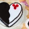 Choco Vanilla Heart Designer Cake featuring heart-shaped layers of chocolate and vanilla, ideal for romantic celebrations and special occasions.