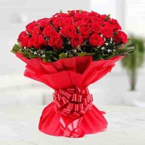 Elegant Red Roses Bouquet featuring fresh red roses, ideal for romantic occasions, anniversaries, or to express love and appreciation.