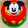 Designer Micky Cake showcasing a vibrant Mickey Mouse design with colorful frosting and playful decorations, ideal for children's birthdays and celebrations.