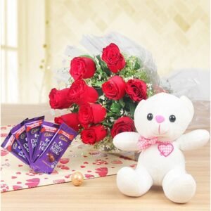 Teddy with chocolates and a vibrant bouquet of fresh flowers, perfect for gifting on birthdays, anniversaries, or special celebrations.