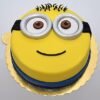 Cute Minion Cake decorated with vibrant colors and adorable minion characters, perfect for children's parties and celebrations, bringing joy to every occasion.