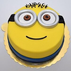 Cute Minion Cake decorated with vibrant colors and adorable minion characters, perfect for children's parties and celebrations, bringing joy to every occasion.