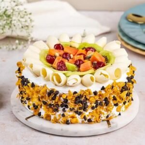 Overload Fruit Cake topped with an abundance of fresh fruits, ideal for celebrations and special occasions.