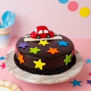 Race Car Adventure Cake featuring vibrant race car decorations and a checkered flag design, ideal for a fun and exciting children's birthday celebration.