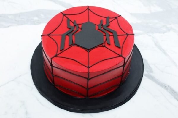 Spidy-Man themed cake with vibrant colors and Spider-Man design, perfect for superhero fans and special birthday celebrations.