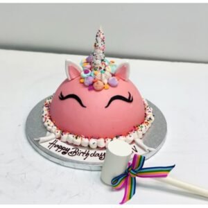 Unicorn design pinata cake with vibrant colors, filled with sweet surprises, ideal for kids' birthday parties and celebrations.