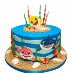 Baby Shark Cake featuring colorful decorations and a playful design inspired by the popular children's song, ideal for kids' birthdays and celebrations.