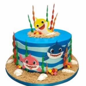 Baby Shark Cake featuring colorful decorations and a playful design inspired by the popular children's song, ideal for kids' birthdays and celebrations.