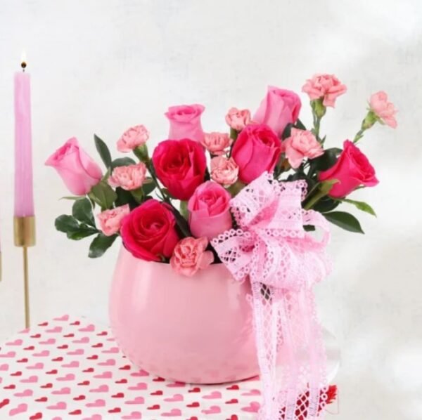 Blossoms of Love in Pink featuring a beautiful arrangement of pink flowers, perfect for celebrating love, appreciation, and special occasions.