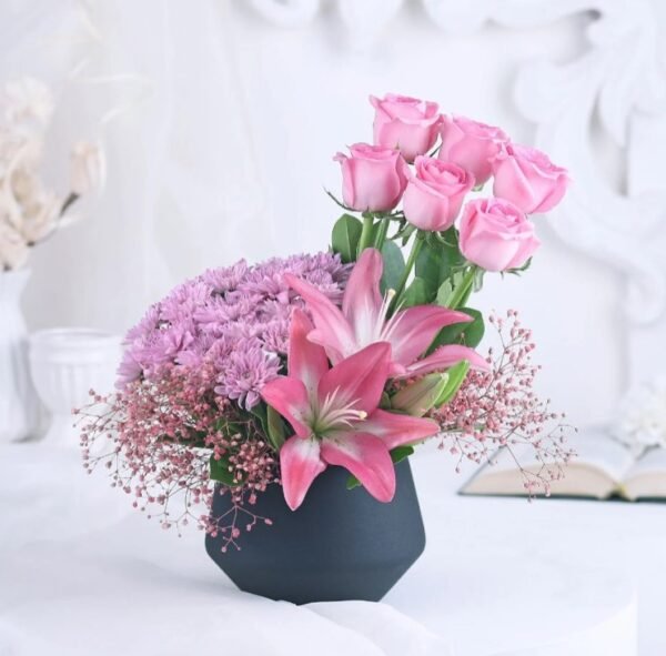 Blush Harmony Bouquet featuring an elegant arrangement of soft pink flowers, ideal for celebrating love and special occasions