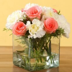 Blushing Beauty bouquet featuring pink roses and white carnations, elegant floral arrangement perfect for gifts, celebrations, and enhancing home decor.