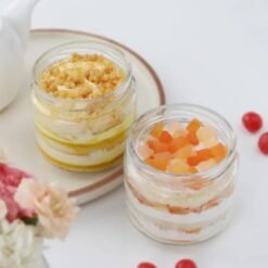 Butterscotch Fruit Jar Duo - Two dessert jars filled with creamy butterscotch layers and fresh fruit, ideal for indulgence and gifting.