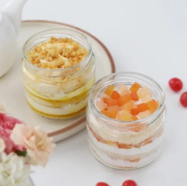 Butterscotch Fruit Jar Duo - Two dessert jars filled with creamy butterscotch layers and fresh fruit, ideal for indulgence and gifting.