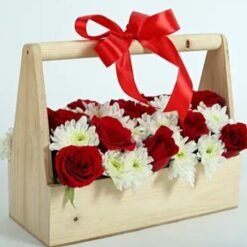 Charming Rose & Daisy Basket featuring a vibrant mix of roses and daisies in a decorative basket, ideal for joyful gifts.