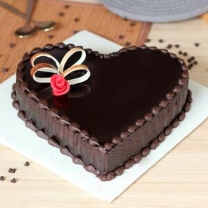 Choco Lovers Heart Cake decorated with rich chocolate frosting and adorned with chocolate decorations, perfect for celebrations and special romantic moments.