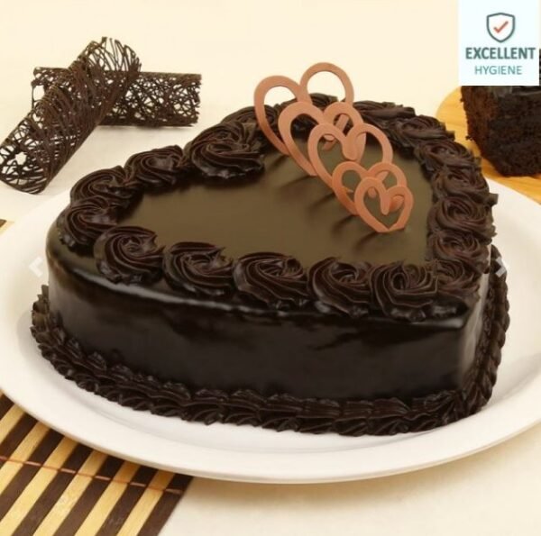 Chocolaty Indulgence Heart Cake decorated with rich chocolate frosting and heart-shaped accents, perfect for romantic occasions and celebrations.