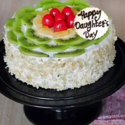 Daughter’s Day Kiwi Cake, featuring moist layers infused with fresh kiwi flavor, beautifully decorated with kiwi slices and whipped cream for a festive touch.