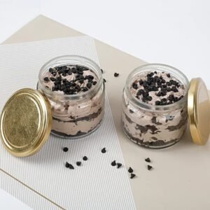 Decadent Chocolate Bliss Cake Jar Quartet showcasing rich layers of chocolate cake and creamy frosting, perfect for chocolate lovers and dessert enthusiasts.