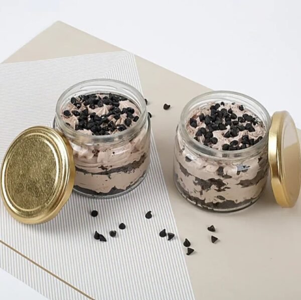 Decadent Chocolate Bliss Cake Jar Quartet showcasing rich layers of chocolate cake and creamy frosting, perfect for chocolate lovers and dessert enthusiasts.