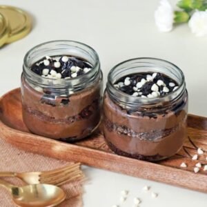 Decadent Chocolate Jar Duo - Two jars filled with rich chocolate layers and velvety frosting, ideal for dessert lovers and indulgence.