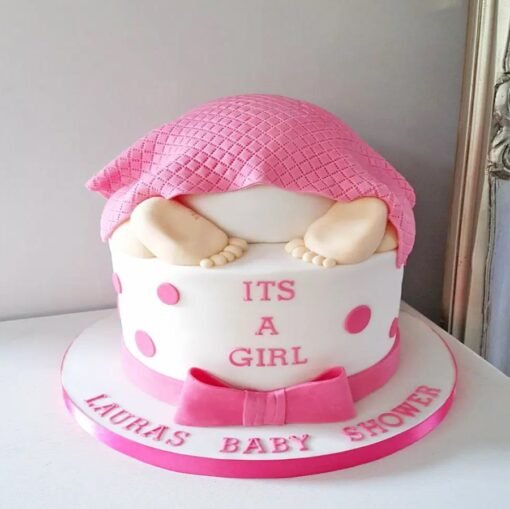 Sleeping Baby Girl Fondant Cake featuring adorable fondant decorations, perfect for celebrating the arrival of a baby girl at baby showers.