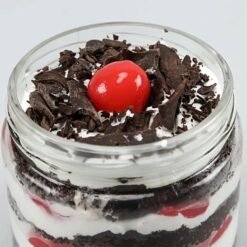 Indulgent Black Forest Cake Jar Collection with rich chocolate cake, whipped cream, and cherries, perfect for dessert lovers.