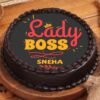 Inspiring Lady Boss Cake, an elegantly designed cake adorned with empowering messages and floral decorations, perfect for celebrating women leaders.