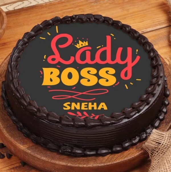 Inspiring Lady Boss Cake, an elegantly designed cake adorned with empowering messages and floral decorations, perfect for celebrating women leaders.