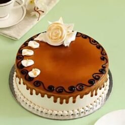 Floral Caramel Dream Cake, beautifully decorated with floral accents and rich caramel layers, ideal for elegant celebrations and special occasions.