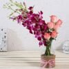 Floral Fusion Jar – a stunning arrangement of fresh flowers in a decorative jar, ideal for brightening up any space.