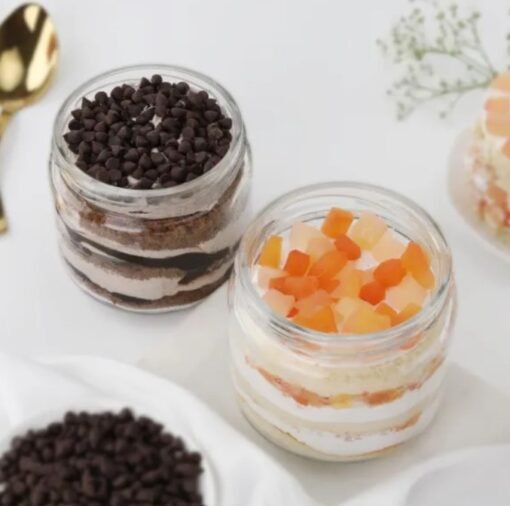 Fruit Fusion Choco Chip Jar Duo - Two dessert jars filled with layers of fresh fruit and chocolate chips, perfect for a sweet treat.